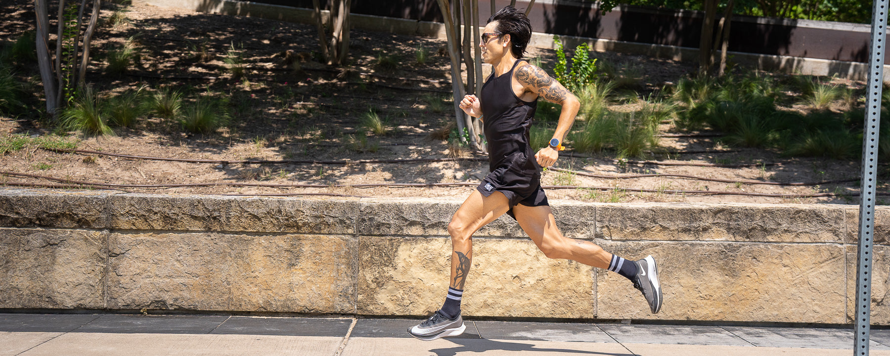 black running shorts and running top in austin