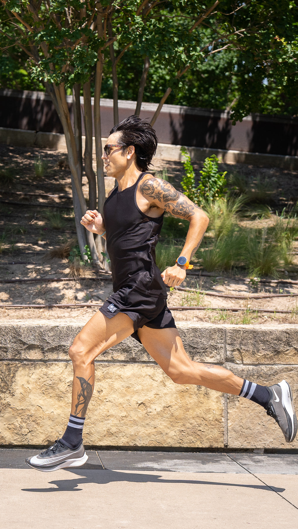 black running shorts and running top in austin